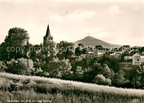 AK / Ansichtskarte Oberpleis Ortsansicht mit Kirche Blick auf den oelberg Oberpleis