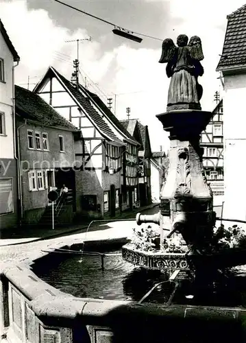 AK / Ansichtskarte Laubach_Hessen Brunnen Altstadt Laubach Hessen