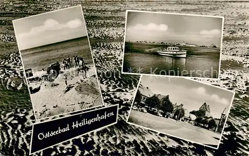 AK / Ansichtskarte Heiligenhafen_Ostseebad Strand Motorboot Ortsansicht Heiligenhafen_Ostseebad