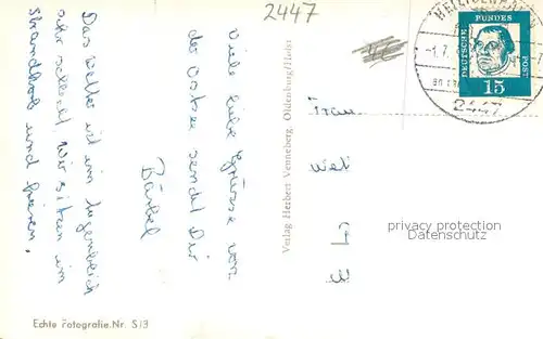 AK / Ansichtskarte Heiligenhafen_Ostseebad Strand Motorboot Ortsansicht Heiligenhafen_Ostseebad