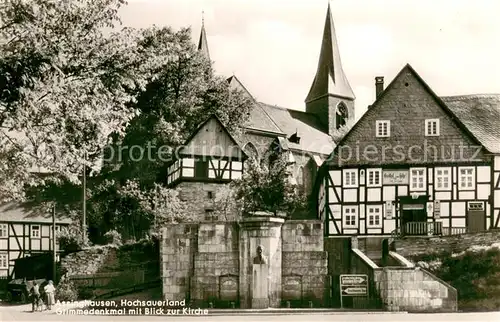 AK / Ansichtskarte Assinghausen Grimmedenkmal mit Blick zur Kirche Assinghausen