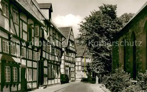 AK / Ansichtskarte Guetersloh Fachwerkhaeuser Apostelkirche Sattlerei Julius Kass Guetersloh