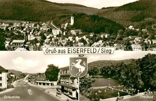 AK / Ansichtskarte Eiserfeld_Siegen Panorama Ortsmitte Freibad Wappen 