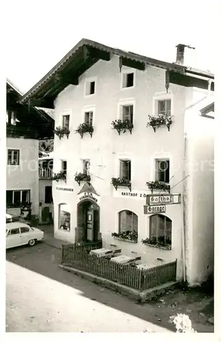 AK / Ansichtskarte Taxenbach Gasthof Fleischerei Garage Taxenbach