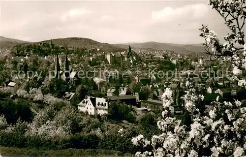 AK / Ansichtskarte Siegen_Westfalen Panorama Blick vom Giersberg auf Siegberg Oberes Schloss Nikolaiturm Michaelkirche Baumbluete Siegen_Westfalen