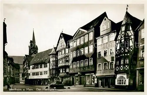 AK / Ansichtskarte Wertheim_Main Der Marktplatz Fachwerkhaeuser Geschaefte Wertheim Main