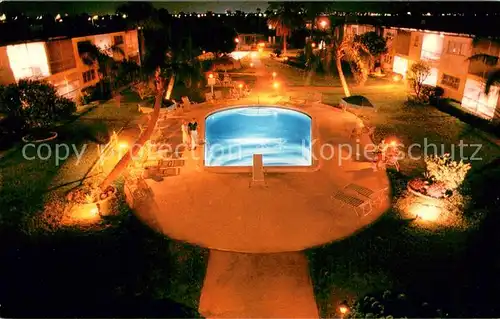 AK / Ansichtskarte St_Petersburg_Florida Snowden Plaza Apartments Swimming Pool at night 