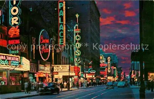 AK / Ansichtskarte Montreal_Quebec Sainte Catherine Street a night looking west Montreal Quebec