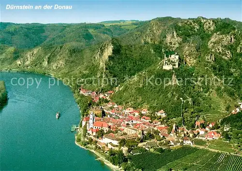 AK / Ansichtskarte Duernstein_Wachau Stadtblick mit Burgruine Schloss und barockem Stift Fliegeraufnahme Duernstein_Wachau