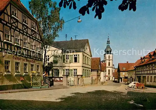 AK / Ansichtskarte Gersfeld_Rhoen Marktplatz Gasthof Kirche Kneipp Luftkurort Gersfeld Rhoen