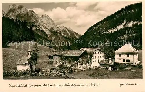 AK / Ansichtskarte Hirschbuehel Mooswacht Gebirgspass Bergdorf Kirche mit Muehlsturzhorn Berchtesgadener Alpen Hirschbuehel Mooswacht