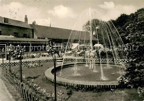AK / Ansichtskarte Amern Park Restaurant Burg Brueggen Gartenansicht m. Brunnen Amern