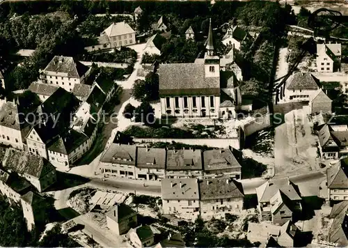 AK / Ansichtskarte Lauterbourg Eglise catholique et la centre Vue aerienne Lauterbourg