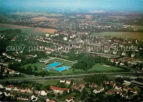 AK / Ansichtskarte Guetersloh Fliegeraufnahme mit Freibad Guetersloh