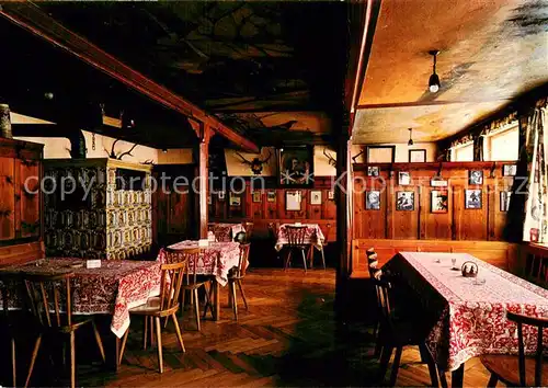AK / Ansichtskarte Bayrischzell Alpengasthof Zum feurigen Tatzelwurm Innenansicht d. Speisezimmers Bayrischzell