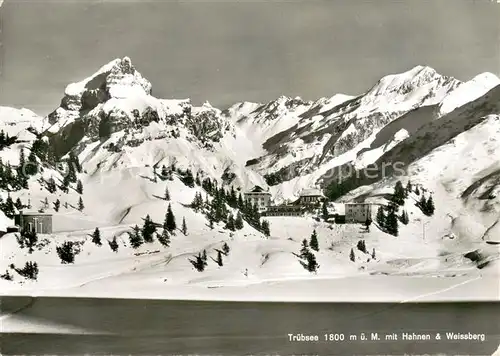AK / Ansichtskarte Truebsee_OW mit Hahnen und Weissberg Winterlandschaft Alpen Truebsee_OW