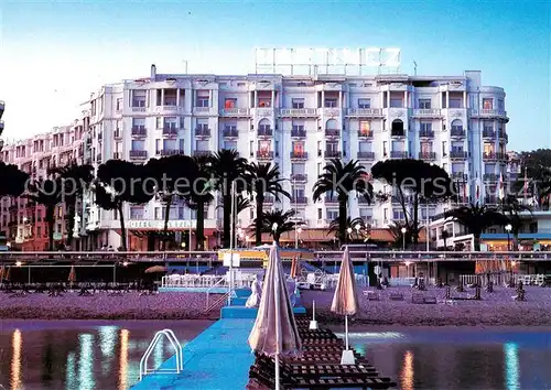 AK / Ansichtskarte Cannes_06 Sur la Croisette Hotel Martinez en debut de soiree 