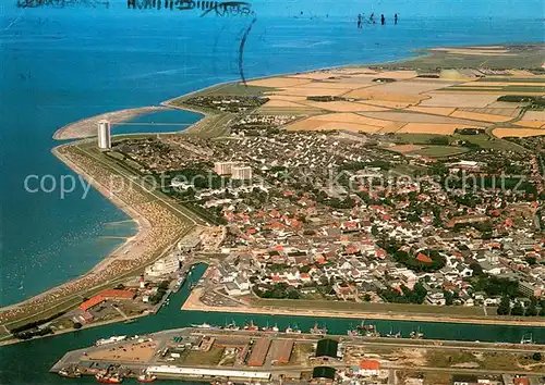 AK / Ansichtskarte Buesum_Nordseebad Hafen mit Strand und Ort Fliegeraufnahme Buesum_Nordseebad