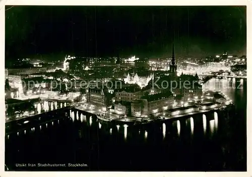 AK / Ansichtskarte Stockholm Utsikt fran Stadshustornet Nachtaufnahme Stockholm