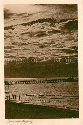 AK / Ansichtskarte Juist_Nordseebad Abendstimmung am Strand Seebruecke Nordseeinsel Juist_Nordseebad