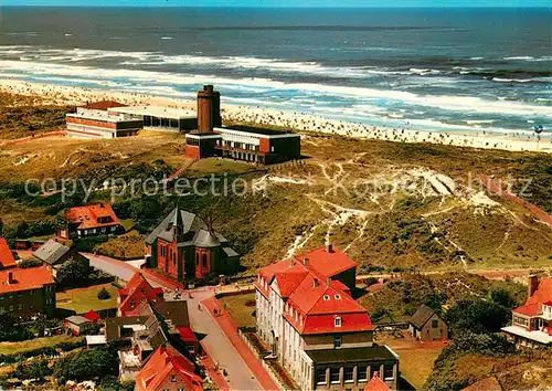 AK / Ansichtskarte Juist_Nordseebad Teilansicht Inseldorf mit Kirche Wasserturm Kurhotel Juist_Nordseebad