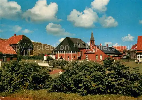 AK / Ansichtskarte Juist_Nordseebad Blick vom Janusplatz zur Kirche Juist_Nordseebad