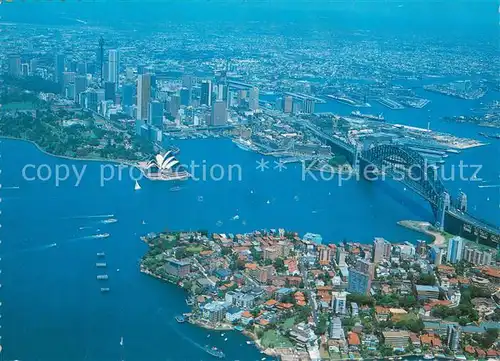 AK / Ansichtskarte Sydney_New_South_Wales Aerial view of Sydney Harbour showing Opera House and Harbour Bridge Sydney_New_South_Wales