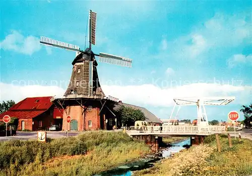 AK / Ansichtskarte Ostfriesland Ostfriesische Landschaft Windmuehle Zugbruecke Ostfriesland