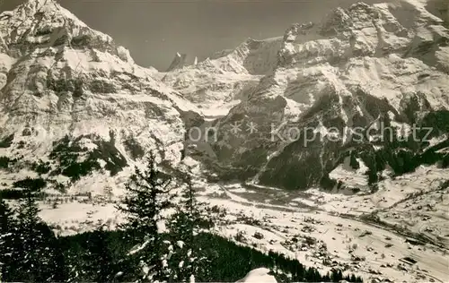 AK / Ansichtskarte Grindelwald Winterpanorama mit Mettenberg Finsteraarhorn Flescherhorn Berner Alpen Grindelwald