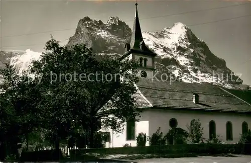 AK / Ansichtskarte Grindelwald Kirche mit Hoernli und Eiger Berner Alpen Grindelwald