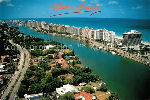 AK / Ansichtskarte Miami_Beach looking north along the intracoastal waterway Hotels Atlantic Ocean aerial view 