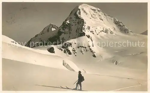 AK / Ansichtskarte Jungfraujoch_3457m_BE Bergwelt mit Eiger und Moench Berner Alpen Skiwanderer 
