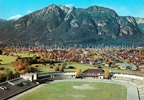 AK / Ansichtskarte Garmisch Partenkirchen Olympiastadionmit Kramer Fliegeraufnahme Garmisch Partenkirchen