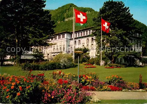 AK / Ansichtskarte Bad_Ragaz_Ragatz Hotel Quellenhof Parkanlagen Schweizer Flagge 