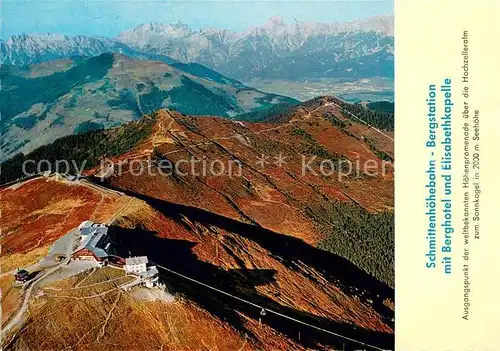 AK / Ansichtskarte Zell_See Schmittenhoehebahn Bergstation mit Berghotel und Elisabethkapelle Fliegeraufnahme Zell_See