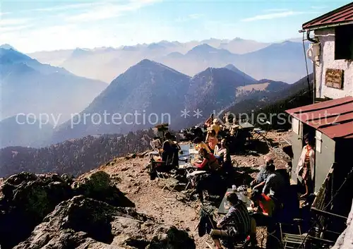 AK / Ansichtskarte Ohlstadt Heimgartenhuette Sonnenterrasse Angergebirge Ammergauer Gebirge Alpenpanorama Ohlstadt