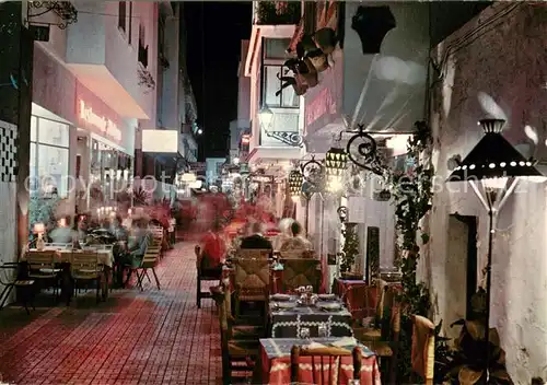 AK / Ansichtskarte Torremolinos Calle del Cauce vista nocturna Torremolinos