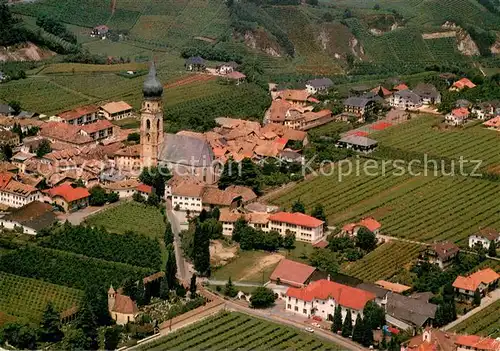 AK / Ansichtskarte ueberetsch Fliegeraufnahme Teilansicht m. Kirche ueberetsch