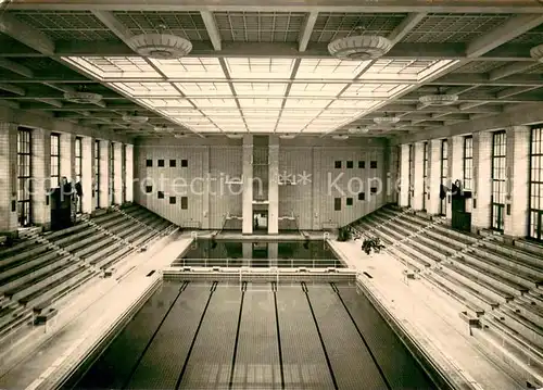 AK / Ansichtskarte Rostock Schwimmhalle Neptun Halle mit Sprungturm 