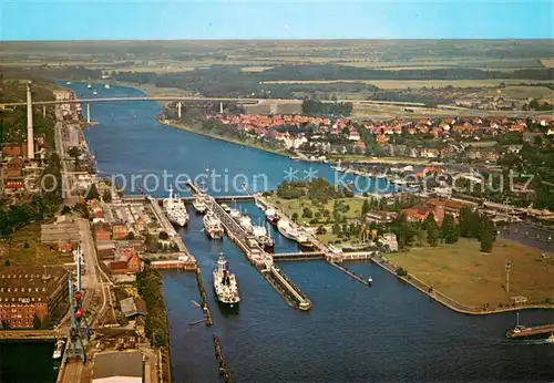 AK / Ansichtskarte Holtenau_Kiel Schleusen mit Hochbruecken Fliegeraufnahme Holtenau Kiel