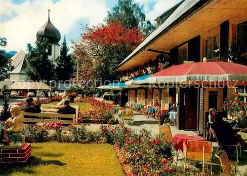 AK / Ansichtskarte Hinterzarten Partie beim Hotel Restaurant Adler Blick zur Kirche Hinterzarten