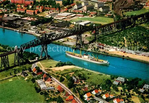 AK / Ansichtskarte Rendsburg Hochbruecke ueber den Nord Ostsee Kanal mit Schwebefaehre Rendsburg