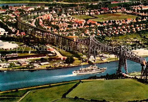 AK / Ansichtskarte Rendsburg Hochbruecke ueber den Nord Ostsee Kanal Fliegeraufnahme Rendsburg
