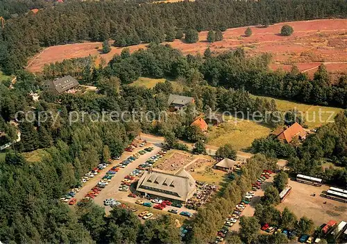 AK / Ansichtskarte Undeloh Gasthaus Undeloher Hof und Seumehaus mit Appartements und Ferienwohnungen Fliegeraufnahme Undeloh