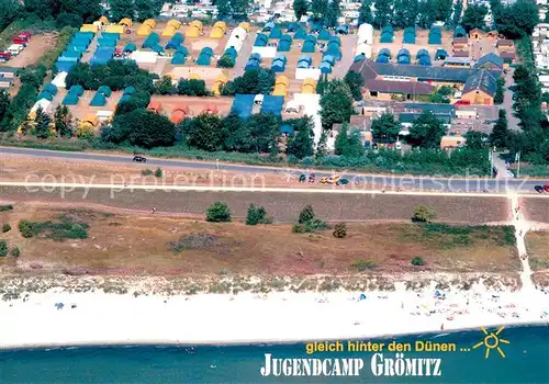 AK / Ansichtskarte Groemitz_Ostseebad Fliegeraufnahme Jugendcamp Groemitz Strand Groemitz_Ostseebad
