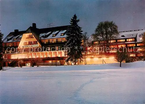 AK / Ansichtskarte Hinterzarten Hotel Weisses Roessle im Winter Nachtaufnahme Hinterzarten