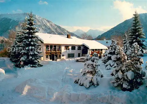 AK / Ansichtskarte Ruhpolding Haus Vier Jahreszeiten Pension Gaestehaus Winterlandschaft Alpen Ruhpolding