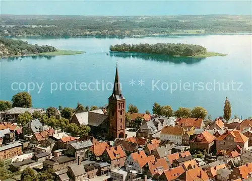 AK / Ansichtskarte Ploen_See Fliegeraufnahme mit Kirche Ploen_See