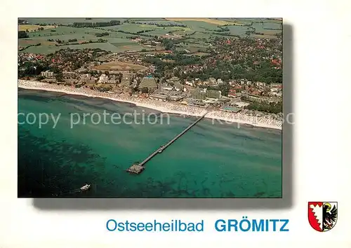 AK / Ansichtskarte Groemitz_Ostseebad Fliegeraufnahme mit Seebruecke Groemitz_Ostseebad