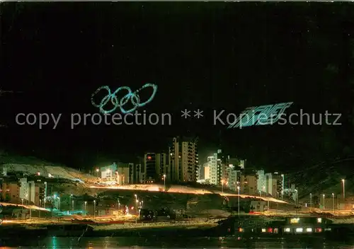 AK / Ansichtskarte Tignes Val Claret Wintersportort Alpen Nachtaufnahme Olympische Spiele Tignes